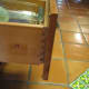 RTA tongue and grove box is deep and has with wood sides and bottom. Shelves and drawers are 1/2 inch solid wood. Drawers soft close and like the doors are full-face.