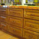Cabinet drawers are deep and full-face.