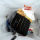 Empty into the trash, and wipe off the turner