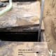 Inlet pipe area shown entering from outside the tank