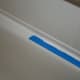 Remove the tape. Notice the hard edges on the caulk. You can leave it, or move on and remove all tape and use your finger to feather the edges out by doing the same method as used with pulling the caulk over the seam the first time.