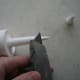 Remove the cap and cut at a 45° angle. Check to see if there are measurements on the tip before cutting. Use a smaller tip for a smaller bead.