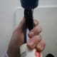 Puncturing the seal using my caulking gun's built in puncturing tool.