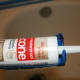 Lay the nozzle of the tub into the guns cutout groove.