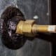The brass fitting shown here contains an orifice type metering device; a simple brass piece with a specifically sized hole in it. A TXV type is more accurate and can adjust to variable pressures and temperatures. You may want request this option.