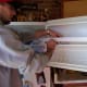 Move the food from the door to the cabinet and clean the door shelving.