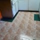 Filling the floor in with vinyl tiles