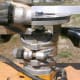 The bit has been moved up 1/4"; the inset photo shows the distance. This router is adjustable in increments of 1/64"; plenty for most work.