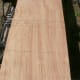 The workpiece is marked for cutting; the nearer line is for the guide bar.