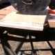 exiting the end grain splinters, even on this plywood. Were it a piece of lumber instead the splintering would be much worse.