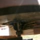 The purpose of that pilot bearing, as seen from below the router. The bearing rides against uncut wood and keeps the router from gouging too far into the side of the workpiece.