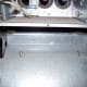 With the board out, you should be able to locate the 2 screws holding the blower in place. They are usually screwed up into the shelf above the blower.