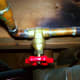 This is a gate valve. This type needs turned clockwise until snug in order to shut off the water.