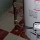 See the gas pipe go past where it turns toward the valve...this is the dirt leg and cap where you "bleed" the line.