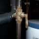 This valve is on. When the handle is sideways to the line, it is off.