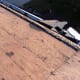This large gap in the sheathing at the edge of the roof needs to be fixed, however.