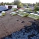 Half of the roof is cleaned off, ready for new felt.
