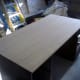 The veneer is in place on the desk