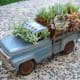 An unusual succulent planter made out of a toy vintage car.