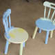 Some chairs in need of fresh paint.