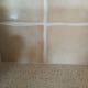 It wasn't necessary to remove any tiles. The overlay is only 7 mm thick and sealed to the tiles.