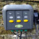 The replacement switch, with push buttons rather than toggle switches.