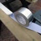 Self-adhesive aluminium tape used as a reflective surface for the LED strip lighting.