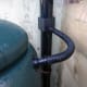 New water butt plumbed into downpipe from shed's guttering, with overflow that feeds the pond.
