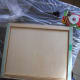 When completely dry I used wood glue to glue the panel in the frame. When that dried, I applied mounting tape to the back following package instructions. I removed the liner paper and pressed the panel to my kitchen island.