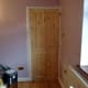 The new solid wood pine door fitted.