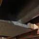Use your paint brush to spread the mastic.