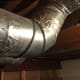 A piece of foil tape around that joint should do the trick. You could even tape the seams that rotate the elbow if you want to get every bit you can.