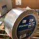 Skrim Tape (Polyken 338) is another type of foil tape that is reinforced with threading making it very durable and must be cut with scissors or a knife rather than torn by hand. Great for ductboard and flexible ducts.