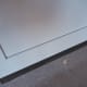 The sweep shown installed on the door