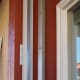 The hinge panel is removable from the door, for choosing which side you want it to swing