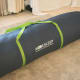This is the inner bag with bright green handles. It looks like a very large duffel bag and the handles makes it much easier to move.
