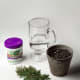 You will need a glass of water, some hormone rooting compound, your cutting and a small container filled with growing medium. I use a commercial potting soil, but you can also use peat moss and sand, or other mediums.