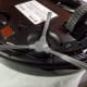 View of side-brush, caster, drive wheel, and charging contacts of Imartine's Coredy R3500