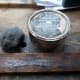 Applying coloured beeswax polish with wire wool.