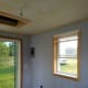 We reinstalled the wall-board and added trim. We also cut an attic access in the ceiling.