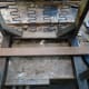 Choosing a suitable piece of scrap wood to make a new front stretcher.