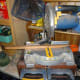 Cutting the wood to the correct length on a mitre saw.
