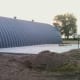 This slab has been carefully worked and cured in order to properly bear the weight of a full grain bin. The site was scraped and filled with builders sand to provide a proper base.