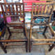 Chairs after being cleaned with the pressure washer: Left, re-stained with wood dye, and right, chair waiting to be re-stained.