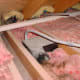 Bathroom vent missing discharge pipe in the attic - should be always discharging to the exterior