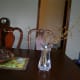 Place the branches in clean, tepid water and wait for the blooms to appear. Change the water every few days.