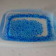 Pour the beads into a container and add water.