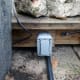 When switch is in up position zone 1 is a live circuit, and when in the down position, zone 2 is live circuit.