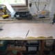 Original decorative trim placed on ¼ inch plywood as template for making a new trim to go the full length of the bureau.