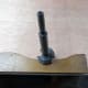 Using the sharp tip of the forstner (gently pressing it in place by hand), and the original decorative trim as a template, to mark where to drill the holes in the plywood when making the new trim.